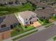 Aerial view of the home shows the location on a corner lot with excellent curb appeal at 944 Benjamin Trl, Davenport, FL 33837
