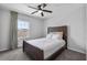 Bedroom featuring a large window and a comfortable bed at 944 Benjamin Trl, Davenport, FL 33837