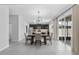 Open-concept living space combining dining, kitchen and living room, perfect for entertaining with tons of natural light at 944 Benjamin Trl, Davenport, FL 33837