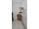 Neat, organized walk-in pantry with white wire shelving providing ample storage space for household items at 944 Benjamin Trl, Davenport, FL 33837