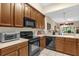 The kitchen includes ample counter space, stainless appliances, and lots of cabinet space at 9440 Myrtle Creek Ln # 1003, Orlando, FL 32832