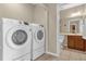 Laundry room featuring washer and dryer set at 9440 Myrtle Creek Ln # 1003, Orlando, FL 32832
