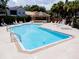 The community pool features a large deck, lounge chairs, and a covered picnic area at 995 Troon Trce, Winter Springs, FL 32708