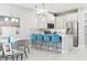 Modern kitchen with sleek countertops, stainless steel appliances, and stylish bar seating at 10009 Randal Walk St, Orlando, FL 32832