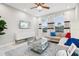 Comfortable living room with stylish decor, plush seating, and abundant natural light at 10009 Randal Walk St, Orlando, FL 32832