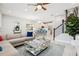 Inviting living space open to a modern kitchen, perfect for entertaining and everyday living at 10009 Randal Walk St, Orlando, FL 32832