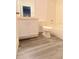 This bathroom has a bathtub and shower combo, a toilet, and a white vanity with storage at 10604 Savannah Wood Dr # 84, Orlando, FL 32832