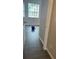 Bedroom featuring wood flooring and a window at 10604 Savannah Wood Dr # 84, Orlando, FL 32832