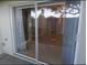 Sliding patio door leading to an outdoor space at 10604 Savannah Wood Dr # 84, Orlando, FL 32832