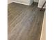 This room features hardwood flooring, white trim, and is painted in neutral colors at 10604 Savannah Wood Dr # 84, Orlando, FL 32832