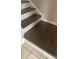 The stairs feature hard wood steps and trim at 10604 Savannah Wood Dr # 84, Orlando, FL 32832