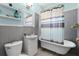 Charming bathroom with a clawfoot tub, white wainscoting, and stylish fixtures at 110 N Brown Ave, Orlando, FL 32801
