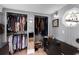 Large closet featuring built-in storage, a window, and lots of hanging clothes at 110 N Brown Ave, Orlando, FL 32801