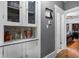Hallway with built in bar/cabinets and view into the bedroom with walk-in closet at 110 N Brown Ave, Orlando, FL 32801