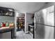 Functional kitchen with stainless steel refrigerator and walk-in pantry at 110 N Brown Ave, Orlando, FL 32801