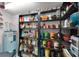 Organized pantry with shelves stocked with food, spices, and storage, with a water heater in view at 110 N Brown Ave, Orlando, FL 32801