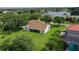 Aerial view of a beautiful home, with large yard, lake and scenic neighborhood at 13524 Lake Luntz Dr, Winter Garden, FL 34787