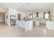 Spacious kitchen with white cabinets, stainless steel appliances, and a large center island perfect for entertaining at 13556 Abberwick Dr, Orlando, FL 32832