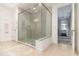 Frameless glass shower with tile surround in the main bathroom at 13556 Abberwick Dr, Orlando, FL 32832