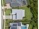 Aerial view of the property showcasing the house, well-manicured landscaping, and neighborhood at 14124 Eliot Ave, Orlando, FL 32827
