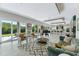 Open living room with modern furnishings and sliding doors to outdoor living space at 14124 Eliot Ave, Orlando, FL 32827