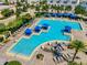 Aerial view of a luxurious pool with cabanas and lounge chairs, perfect for relaxing and enjoying the sunshine at 14124 Eliot Ave, Orlando, FL 32827