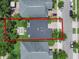 Aerial shot of a home showcasing its backyard, layout, landscaping, and neighborhood at 14193 Gold Bridge Dr, Orlando, FL 32824
