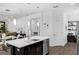 Modern kitchen with an island and stainless steel appliances at 14193 Gold Bridge Dr, Orlando, FL 32824
