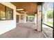 Spacious screened lanai with outdoor lighting and ceiling fan at 1424 Mt Laurel Dr, Winter Springs, FL 32708