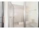 Close up of renovated walk in shower with white tile at 1424 Mt Laurel Dr, Winter Springs, FL 32708