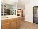Spacious wet bar featuring abundant cabinetry and glass shelving for storage and serving at 1424 Mt Laurel Dr, Winter Springs, FL 32708