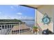 Charming balcony with a nautical theme, offering a serene spot to unwind and enjoy picturesque water views at 145 N Halifax Ave # 705, Daytona Beach, FL 32118