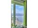 Bright balcony view overlooking the water with a bridge in the distance, inviting relaxation and scenic enjoyment at 145 N Halifax Ave # 705, Daytona Beach, FL 32118