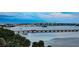 Expansive water view of the bridge featuring modern street lamps and a tranquil waterway at 145 N Halifax Ave # 705, Daytona Beach, FL 32118