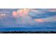 Expansive view of soft, pastel-colored clouds over a distant cityscape, offering a serene and picturesque setting at 145 N Halifax Ave # 705, Daytona Beach, FL 32118