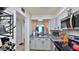 Well-appointed kitchen with gray cabinets, stainless steel appliances, and a functional layout for cooking at 145 N Halifax Ave # 705, Daytona Beach, FL 32118