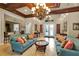 Comfortable common area featuring stylish seating, elegant lighting, and a welcoming atmosphere at 1461 Travertine Ter, Sanford, FL 32771
