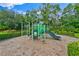 Community playground with a variety of climbing structures, slides, and swings at 1461 Travertine Ter, Sanford, FL 32771