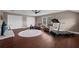Spacious bonus room, with plenty of natural light and space for exercise equipment and lounge area at 1462 Palm Bay Ct, Lake Mary, FL 32746