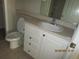 Bathroom vanity with white cabinetry, neutral countertop, and sink at 1960 Legacy Cove Dr, Maitland, FL 32751