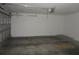 Empty two car garage with an automatic garage door opener at 1960 Legacy Cove Dr, Maitland, FL 32751