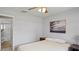 Bedroom with gray walls, ensuite bathroom and a window with blinds at 1963 Forest Ave, Daytona Beach, FL 32119