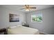 Bedroom with gray walls, a window with blinds and neutral colored carpet at 1963 Forest Ave, Daytona Beach, FL 32119