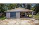 Charming home with a spacious open garage and carport, offering both style and functionality at 1963 Forest Ave, Daytona Beach, FL 32119