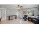 Bright living room featuring neutral walls, tile flooring, and a welcoming entryway at 1963 Forest Ave, Daytona Beach, FL 32119