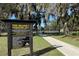 Pine Meadows Recreation Area with court, sidewalk, and shade trees at 2043 Town Pasture Dr, Eustis, FL 32726