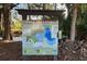 The Pine Meadows Conservation Area site map shows trails, ecosystems, parking, and site directory at 2075 Town Pasture Dr, Eustis, FL 32726