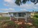 Backyard screened in patio great for entertaining while enjoying your outdoor living at 215 Rydalmont Rd, Winter Haven, FL 33884