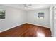 Bedroom featuring hardwood floors and a closet at 215 Rydalmont Rd, Winter Haven, FL 33884