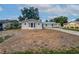 Charming single-story home with a well-manicured lawn and a new roof at 215 Rydalmont Rd, Winter Haven, FL 33884
